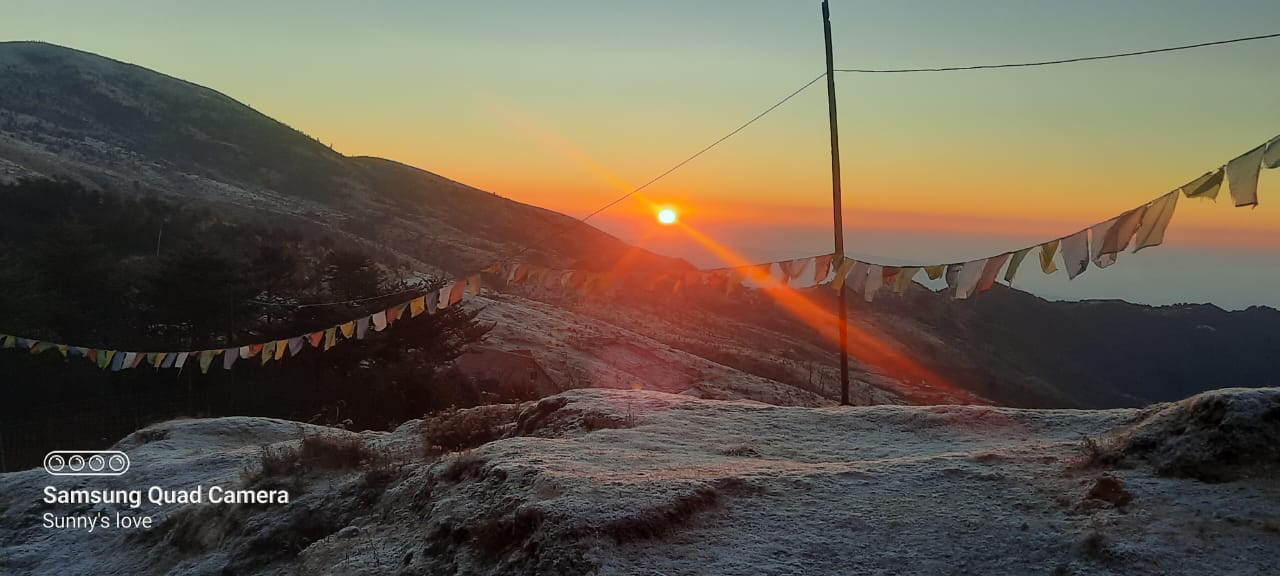 GreenHill Paradise homestay lit warmly under a full moon